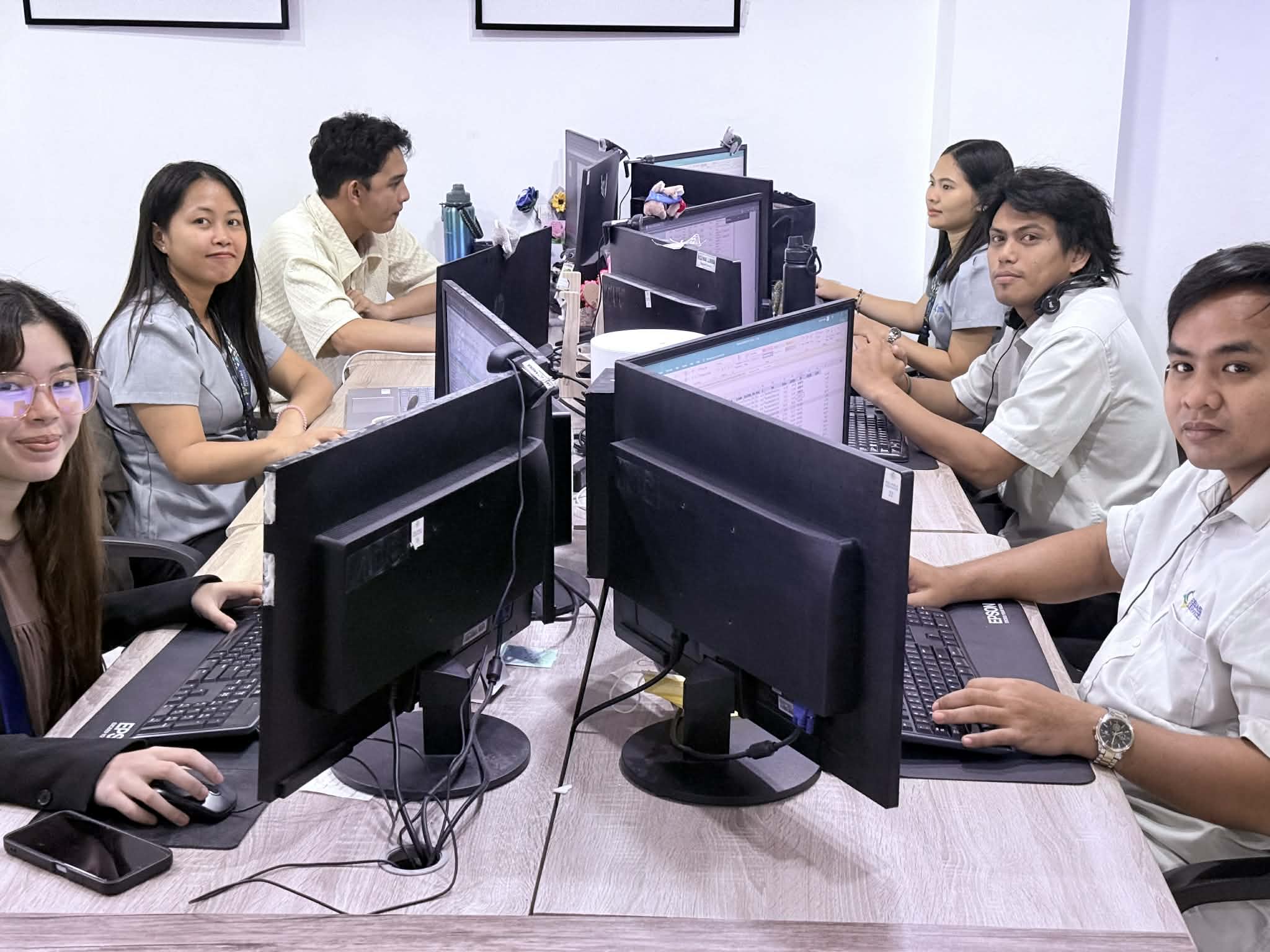 Accounting support team reviewing financial operations
